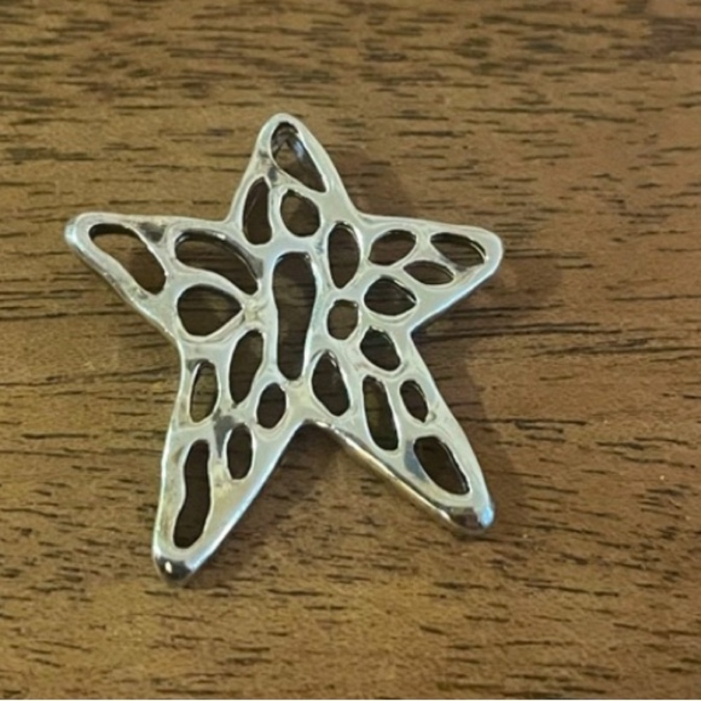 Intricate Starfish Cutout Pendant